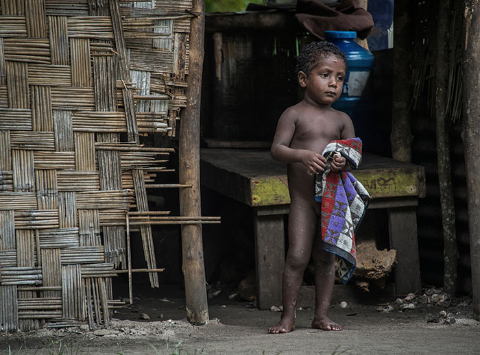 A young child on Hawaii Island, Manus Province PNG - by Brian Cassey