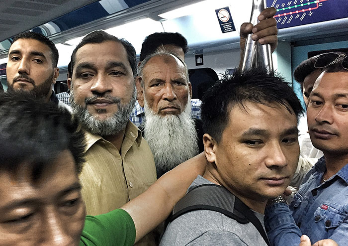 Dubai Metro - crowded male Metro carriage segregated by sex (female carriage half empty) -image by Brian Cassey